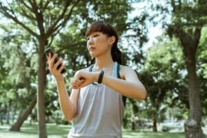 Person checking heart rate using a smart watch