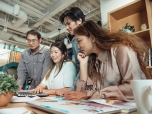 A team viewing a customer-focused B2P marketing campaign