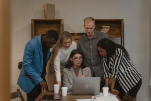 A business team discussing how B2B and B2C strategies overlap in B2P